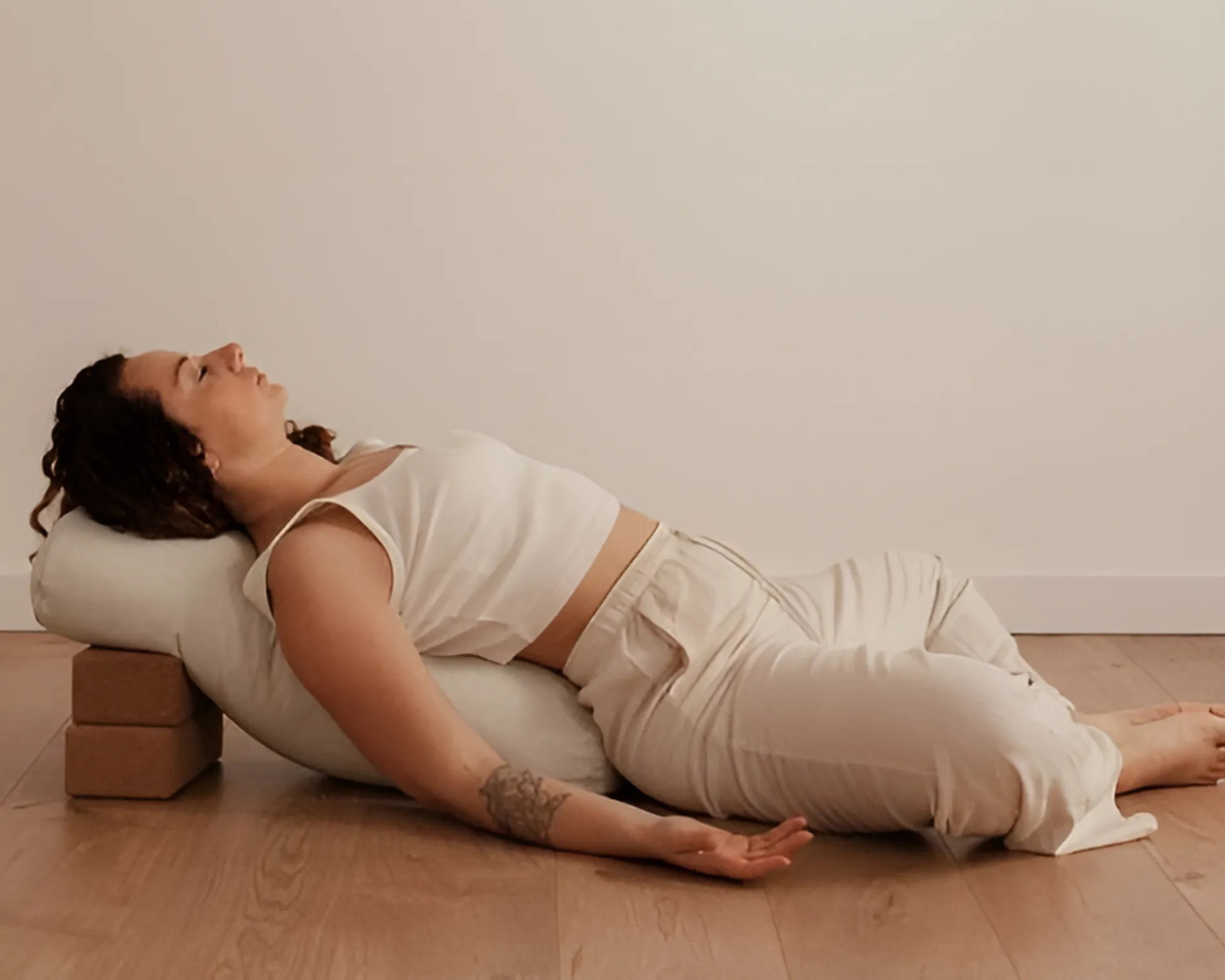 Women resting in yoga pose for deep sleep